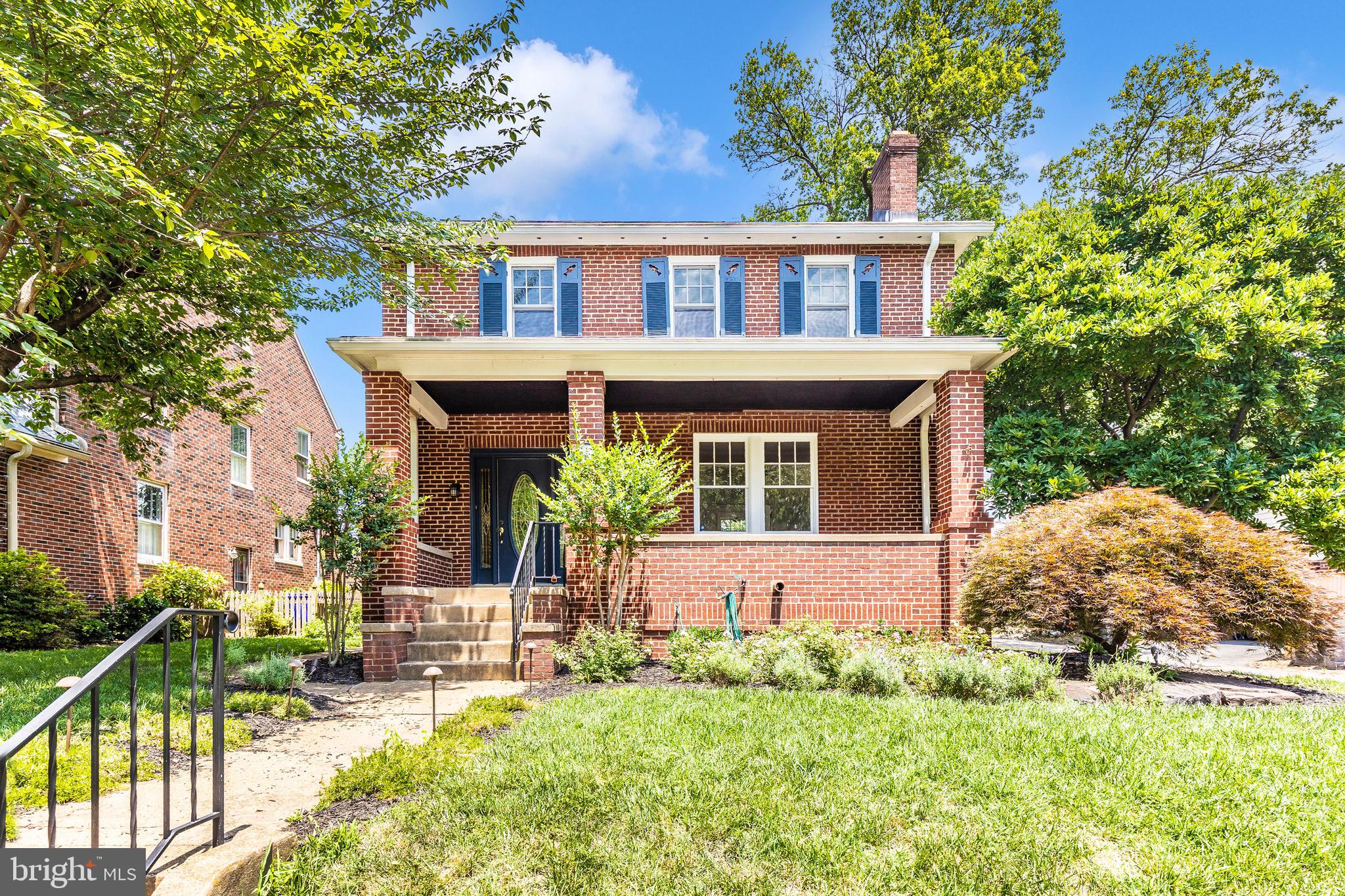 Charming Brick Porch Front Home with Park Views & Endless Character! Wake up to beautiful views of Baker Park and enjoy your morning coffee on the welcoming covered front porch of this timeless brick-front home. Inside, you’re greeted by original, refinished hardwood floors and an abundance of natural light throughout. The living room is filled with warmth and character, featuring elegant glass double doors, built-in cabinets, and a cozy fireplace with a new gas insert and custom handmade black walnut mantle—perfect for relaxing or entertaining. Host dinner parties in the formal dining room, then gather in the spacious eat-in kitchen boasting granite countertops, stainless steel appliances, a tile backsplash, and plenty of updated cabinetry and prep space. Just off the kitchen, the great room is a showstopper with walls of windows, an electric fireplace with a custom handmade cedar mantle from the Pacific Northwest, and direct access to the expansive back deck—ideal for indoor-outdoor living. A luxurious fully renovated main-level full bathroom features spa-like finishes and a custom-tiled walk-in shower. Upstairs, you'll find four generously sized bedrooms filled with light, along with a fully renovated full bath featuring a custom-tiled tub/shower combo for ultimate relaxation. The finished third floor adds even more versatility—perfect for a home office, gym, playroom, or fifth bedroom. The lower level is partially finished, ideal for a rec room or entertainment area. Enjoy summer BBQs on the large deck and never worry about parking with your own detached garage and carport. Conveniently located along Baker Park and just minutes to Route 15, I-70, and all the dining, shops, and charm of downtown Frederick—this home truly has it all!
