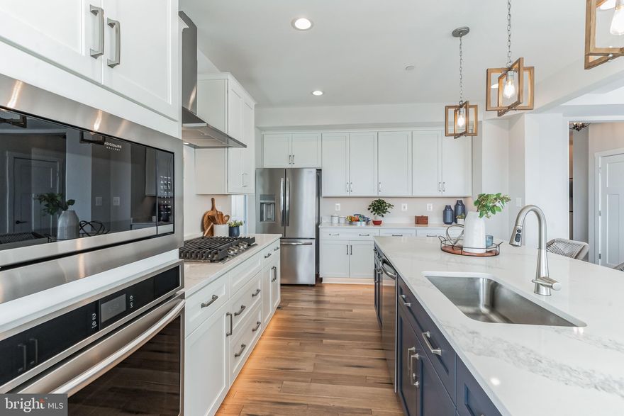 THE SOUTHILL is a stunning home with unbelievable standard features. Are
you looking to retire in place or perhaps need a 2nd Owner’s Suite this house can make the perfect
multi-generational home with all the open living space you could want with a choice room on the
first level; make it your office or a formal dining room. The 1st floor Owner’s Suite has space to
accommodate a sitting area along with an oversized closet and luxury shower bath. Upstairs
bedrooms have fantastic space along with an upstairs loft to keep the entertainment from
trickling down the stairs. The hall bath has a double vanity standard and you can opt to do the
upstairs laundry for added convenience. A standard THREE car garage and full front covered
porch are standard along with a full unfinished basement. Associated Land listing #MDBC2120964