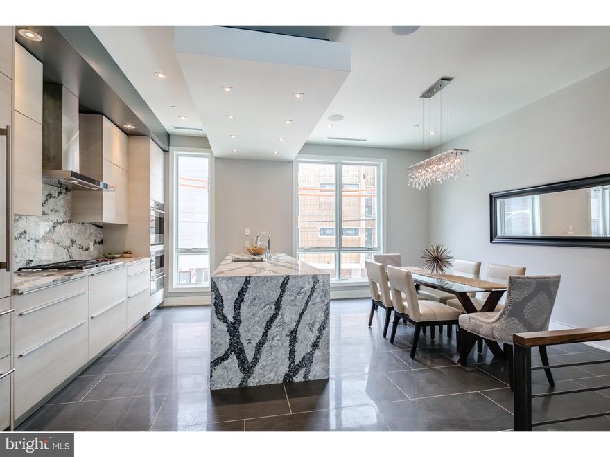 Three homes already sold!! get in before any price increases! One of a kind New Construction with Elevator, 2-car garage, 4 Decks including two Roof-decks, Smart-home tech system, 4500sq' of Luxury and most finely appointed details in the city. Liberty Estates Townhomes has it all. Included in this sophisticated home is a theater room, and a game room with large wet bar that's perfect for entertaining. The living room, dining area and living room has heated floors. The wide open and extra wide living area has a built in fireplace with stone ledge, and this magnificent space spills onto a rear tiled deck that will make you feel like you are in Miami. The kitchen is spectacular, with Sub Zero and Wolf appliances, custom Italian cabinetry, custom counter tops including a HUGE island with cascading waterfall stone edge and a custom floating ceiling with accent lighting. The extra wide, 20' wide floor plan allows for a huge dining area right next to the kitchen. The interior iron railing system continues throughout the home along an elegant Black Walnut wood staircase. The roof decks are equipped with a kitchenette with sink, fridge and built in grill. The private deck off the master suite, and the deck off the living room supply a ton of outdoor square footage, totaling over 900 Sq feet. All of the bedrooms have great space and have ample walk in closets and accompanying bathrooms with the finest Grohe and Kohler finishes. The full floor master suite has it all, a six foot Kohler soaking tub, heated floors, double vanity, glass tile shower, deck and huge closets. Each bathroom is unique and has only the best materials. The woodwork throughout the home is stunning- including the custom baseboards and solid wood doors t/o. This may be the most well thought out home in the city. Not one inch of space has been wasted. Come visit our 100% complete and ready to be lived in Model home. Still time to customize the other homes in the development. 10 year tax abatement pending!! 100% complete and ready for move in !!  The finished basement and all heated floors are an UPGRADE and not included in the price.