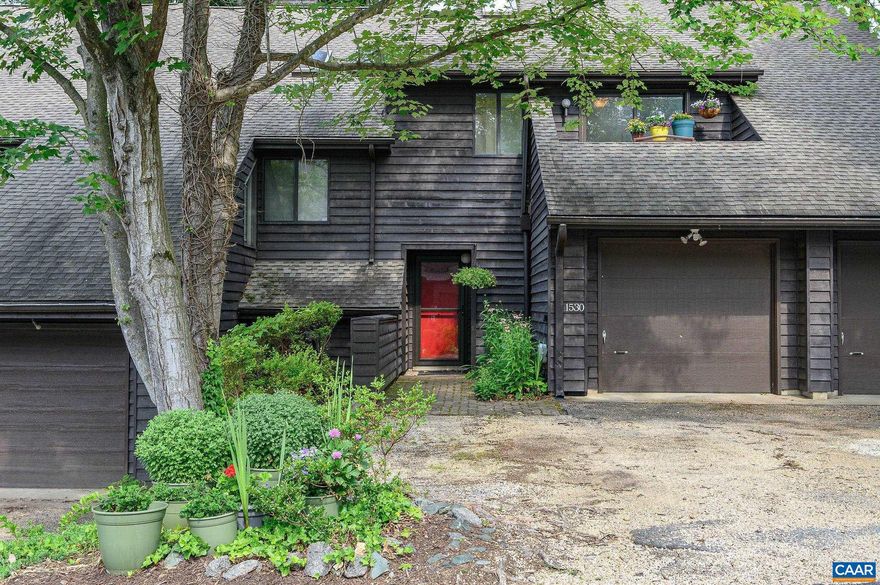 Excellent opportunity to be centrally located in Birnam Wood! This updated townhome is just minutes from the Shops at Stonefield, less than 10 minutes from UVA's Darden School of Business and the Law School, and only 15 minutes to UVA Hospital and downtown Charlottesville. The gorgeous, completely renovated kitchen is a dream with it's light grey cabinets, quartz countertops, glass tile backsplash, durable laminate tile flooring & stainless steel appliances. The main level also boasts luxury plank vinyl thoroughout, with a cute updated half bath, dining area, wide family room with wood burning fireplace and screened porch. Natural light from two skylights floods the open staircase as you asend to a landing where you will find the first bedroom with balcony and updated full bath with sweet blue & white ceramic tile flooring. Continue up the stairs to an open loft perfect for a home office, and the spacious primary suite with walk-in closet, and ample additional storage. Townhome backs to a wooded common area for added privacy. HOA includes: trash, recycling, pest treatments, groundskeeping, exterior maintenance including roof & roads. Direct access to paved trails in wooded Charlotte Yancey Humphris Park.,Painted Cabinets,Solid Surface Counter,Wood Cabinets,Fireplace in Family Room