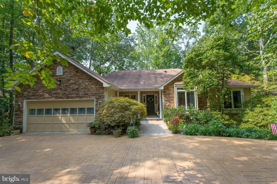 A Waterfront home that is sure to surprise you with its naturally landscaped paths, breathtaking Water View rooms, large Screened Porch overlooking the Lake, or take a boat ride on your Keaton Lake from your Private Dock. Stamped Concrete circular drive with Paver Retaining Walls add to the appeal of this home. Also Anderson Windows, GE Cafe Double Oven, & New 30yr Architectural Roof 2016.