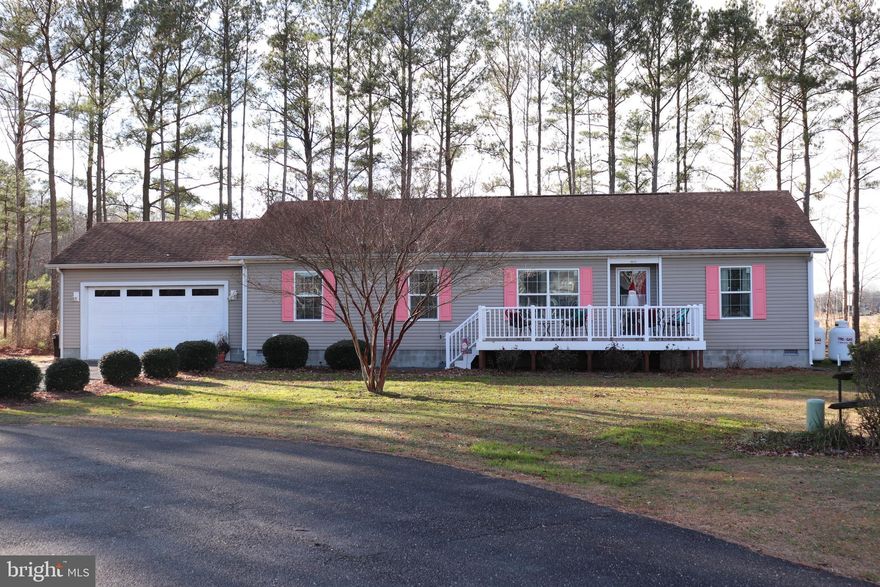 Welcome to 37602 Fenwick Cir, a 3 Bedroom, 2 Bath home at the end of a Cul-De-Sac in Fenwick West. Built in 2014, this home has a nice front deck, an open floor plan with 2 living areas, a good sized kitchen with an island, gas stove and plenty of cabinet space. The dining area is just off the kitchen leading to the second living area. The Primary Bedroom has plenty of space and a large closet. The Primary Bath has a vanity with double sinks, a nice walk-in shower and a large linen closet. The 2nd and 3rd bedrooms are off the second living area and share a full bath. The 2-car garage offers ample space for parking and workbench or storage. Out back is another deck to enjoy your morning coffee or glass of wine. The spacious yard is partially fenced and backs to trees. This home is close to shopping, restaurants, Bethany Beach, Fenwick Island and Ocean City MD and a 5 minute drive to Freeman arts Pavilion, which hosts national acts during their Summer Concert Series. Make this home yours and start enjoying the beach life!