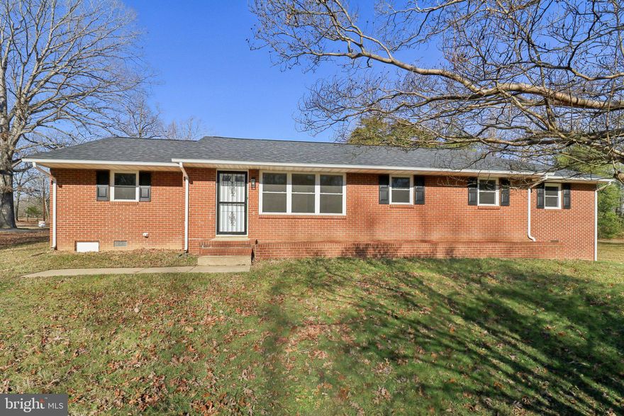 This beautifully updated 4-bedroom, 2-bath brick rambler offers spacious living on a serene 1.5-acre lot. With 1,900 sq. ft. of living space, the home features a primary suite with a luxurious soaking tub, double vanity, and separate shower. Recent upgrades include all-new carpet, luxury vinyl plank flooring in the kitchen, laundry, and mudroom, new kitchen cabinets, granite countertops, stainless steel appliances, new windows, a new roof, and fresh paint throughout.

Enjoy ample storage and workspace with an attached 1-car carport, a detached 1-car garage with a workroom, and a shed. Move-in ready and designed for comfort and style, this property is the perfect blend of modern updates and classic charm