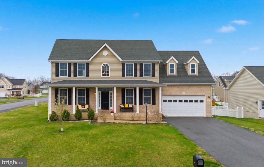 Welcome to this beautifully maintained 2020-built home in the sought-after Webber Springs community of Inwood! Enjoy the benefits of newer construction with modern efficiency, low maintenance, and stylish, high-end finishes throughout. From the moment you step inside, you’ll notice the attention to detail—thick crown moulding, rich real wood flooring, oak wood stairs, and an elevated kitchen featuring glazed cabinetry, granite countertops, stainless steel appliances, a center island, and a spacious eat-in area.

The main level offers a functional and flexible layout with a formal dining room and an additional living space perfect for a home office or second sitting area. Upstairs, you’ll find 4 generously sized bedrooms and 2.5 baths, including a spacious primary suite with elegant tray ceilings, a walk-in closet, and a well-appointed en suite bath featuring a double vanity, separate shower, and relaxing soaker tub.

The full unfinished basement offers endless potential—whether you’re looking to expand your living space, create a home gym, or design the perfect recreation area.

Relax on the charming front porch and enjoy being part of a well-established neighborhood just minutes from I-81, making commuting a breeze. This home truly combines modern convenience with timeless style—don’t miss your opportunity to make it yours!