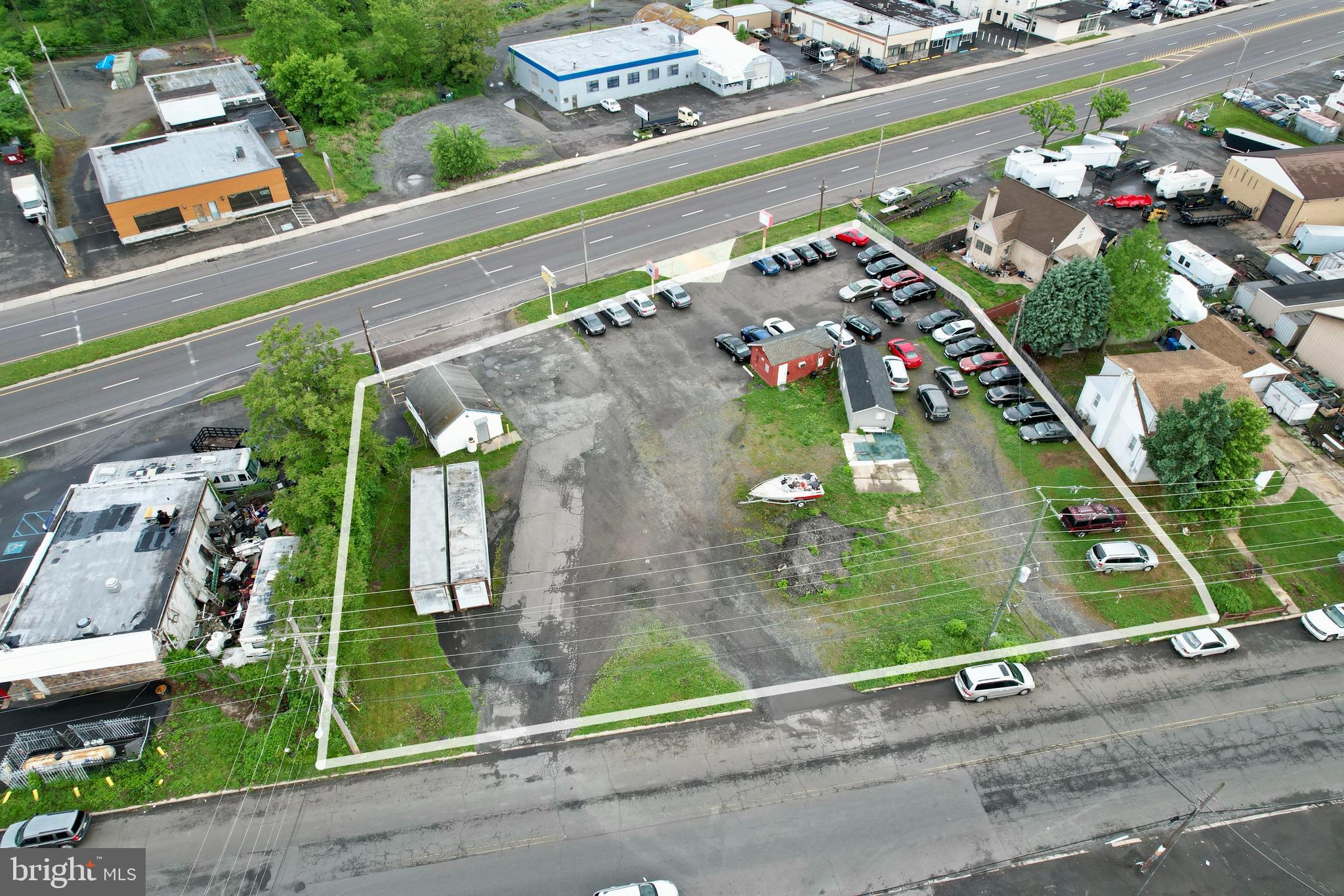 HUGE INCOME OPPORTUNITY! CASH COW ! Large 3 unit commercial lot on sitting on 0.59 acres at a prime location on Route 13 at the intersection of Route 13 (Bristol Pike) & Beaver Dam Road. - Very busy location, high traffic area with great visibility. High traffic count of 30,000 vehicles a day! Lot offers 190 ft of frontage on US Route 13. Exceptional development site for many uses, including commercial, retail, used automotive sales, auto repair shop, fast food, medical offices, motel, bar/restaurant and much more. Other approved zoning uses include: New Car Dealer, Car Rental Agency, Auto Detailing, Auto Tags, Limousine Service and Bus Company. Units comprised of two used auto sales car lots each with own building and a retail building used as check cashing office. There is room to park up to 100 cars !! It is near impossible today to obtain a user automotive sales license unless already grandfathered in like this location. Experienced Owner willing to assist new Owner with necessary license applications * This is your once in a life opportunity to capitalize on this RARE lucrative business opportunity !