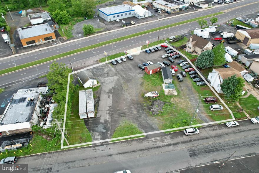 HUGE INCOME OPPORTUNITY!  CASH COW !  Large 3 unit commercial lot on sitting on 0.59 acres at a prime location on Route 13 at the intersection of Route 13 (Bristol Pike) & Beaver Dam Road.  - Very busy location, high traffic area with great visibility.  High traffic count of 30,000 vehicles a day!   Lot offers 190 ft of frontage on US Route 13.  Exceptional development site for many uses, including commercial, retail, used automotive sales,  auto repair shop, fast food, medical offices, motel, bar/restaurant and much more.  Other approved zoning uses include: New Car Dealer, Car Rental Agency, Auto Detailing, Auto Tags, Limousine Service and Bus Company.  Units comprised of two used auto sales car lots each with own building and a retail building used as check cashing office.  There is room to park up to 100 cars !!  It is near impossible today to obtain a user automotive sales license unless already grandfathered in like this location.  Experienced Owner willing to assist new Owner with necessary license applications *  This is your once in a life opportunity to capitalize on this RARE lucrative business opportunity !
