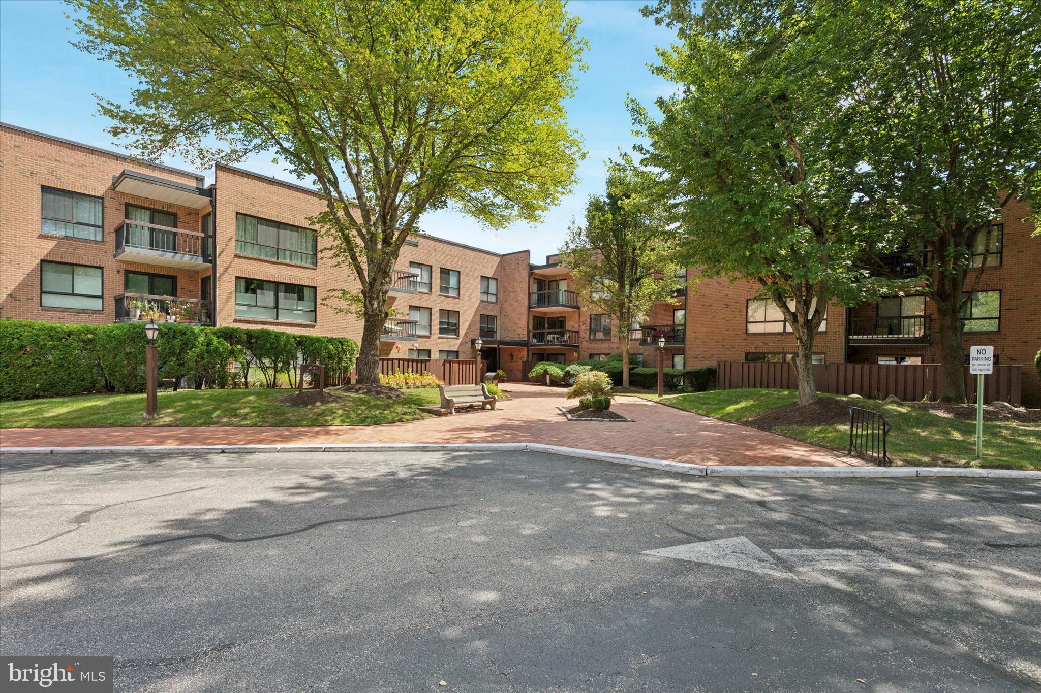 Come see this lovely condo at Hill House! Updating has already been completed in this well maintained home. This condo boasts an inviting open floor plan, a kitchen-perfect for both casual dining and entertaining. Two spacious bedrooms and two full baths. Hardwood floors throughout the living area and kitchen. The kitchen with off white cabinetry, breakfast bar, granite counters, marble backsplash ,stainless appliances and pantry cabinet is ready for the gourmet. The living and dining areas are expansive. Sliding doors open to a fabulous , balcony expanding your living space. The primary suite is a sanctuary of comfort and style. The walk in closet offers ample storage space. The newer primary ensuite bath with vanity and walk-in shower offers convenance. The second bedroom has access to the balcony through sliding doors that create a bright and welcoming atmosphere. A modern and convenient laundry area holds your washer and dryer with extra storage space. Updated bathrooms feature glass doors, tile floors, and newer vanities, providing convenience and aesthetic appeal. The low monthly condo fee includes snow removal, landscaping, insurance, water, sewer and trash service. This unit also has a large storage units in the building. There is a convenient trash shoot down the hall to make life much easier. Hill House features a welcoming new and secure entrance foyer, elevator and sunny and bright first floor atrium. Located minutes from shops and restaurants, Holy Redeemer Hospital, the Pennypack Trail. You will be minutes to the train or Philadelphia. Don't miss this opportunity to experience elevated living at Hill House. Schedule your showing today!