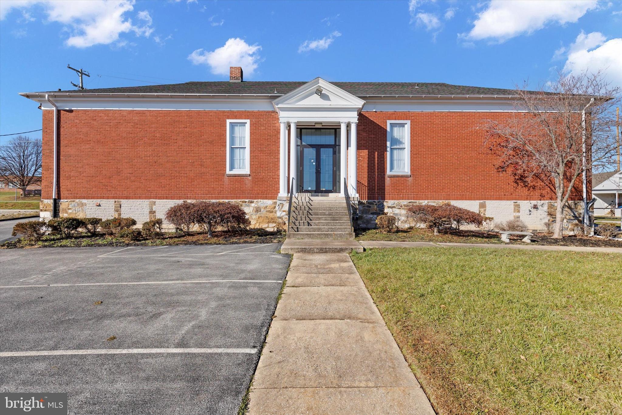 This two level office building is ready for its new owner! The first floor features a dozen office spaces, a front desk/reception area and half bath. The bottom floor includes a storage room with a walk in safe, men and women’s restroom, utility room and a flex room that could be used for additional office space, a conference room or storage. Off of the conference room in the bottom level, there is handicap ramp access. The possibilities are endless for this nearly 6,000 square foot brick building. Call today to schedule a showing!