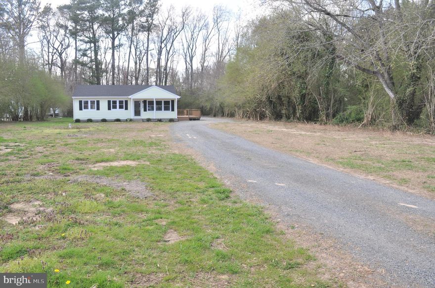 READY TO MOVE IN. ALL NEW INTERIOR PAINT AND FLOORING. NEW STAINLESS STEELE RANGE, REFRIGERATOR AND DISHWASHER. VINYL SIDING MAKES THE EXTERIOR ALMOST MAINTEANCE FREE. OUT OF CITY LIMITS SO NO CITY TAXES BUT ONLY A COUPLE OF MINUTES FROM SHOPPING.  MOST TYPES OF FINANCING WOULD BE AVAILABLE. SIT ON THE FRONT PORCH OR PRIVATE SIDE DECK. STROLL AROUND THE LARGE FRONT AND REAR YARDS. EASY TO VIEW.