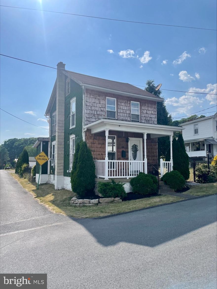 Welcome to this quaint farm house on a nice sized lot! The interior of this home has been lovingly cared for which is evident as you will find hardwood floors,  vinyl replacement windows, solid wood 20 handle kitchen cabinetry and newer appliances. first floor bathroom, first floor laundry. The main level also features a wood pellet stove that will keep heating bills down. On the 2nd level you have 2 ample sized bedrooms, There is an attic on the 3rd floor that could be a 3rd bedroom. Two sheds and off street parking in the rear of the home. The large lot is mostly fenced in and would be the perfect place for relaxing and gatherings!