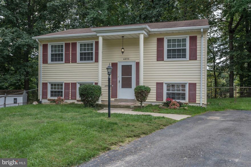 Well Maintained Three Bedroom Split Foyer Home Located in A Cul-De-Sac! Clean, Light and Bright! Features New Carpeting! Vinyl Double Pane Windows. Kitchen w/updated appliances, counters and cabinets. Lower level Ceramic Tile Floors. Family room walks out to Patio & yard. Washer & Dryer Convey. New HVAC in 2015. Fully Fenced Rear Yard backing to trees! Convenient to I-95, Hot Lanes & Shopping!