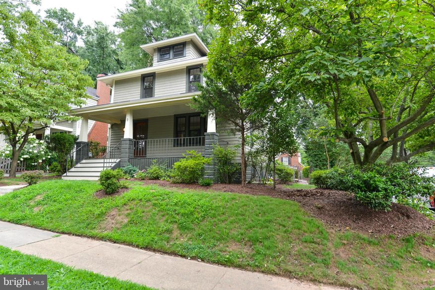 American Beauty in Rosemont Park.  1928 vintage American Four Square Craftsman home has been beautifully restored and renovated.  Architectural shingle roof, authentic Arts & Crafts period colors, lovely front porch, deck, addition, updated kitchen and baths, addition, detached garage and driveway.  Home sits on 2 lots.  Lovely tree lined street in great old neighborhood.  Walk to 2 Metro stations