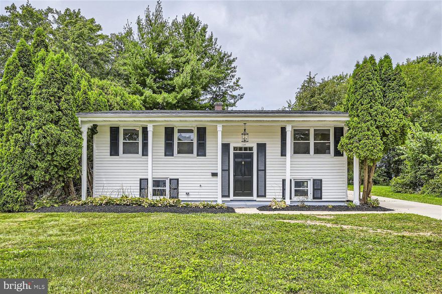 Beautifully renovated 4BR2.5BA split foyer located on a quiet street in Reisterstown.  Walk up to the front door of your forever home, and step inside a bright foyer with a view of the main floor and lower level. The main floor beams with tons of natural light, beautifully flooring and an open concept flow.  The large living room is open to the dining room and kitchen.  The kitchen offers cabinets to the ceiling, quartz countertops with a complimenting backsplash, and stainless steel appliances.  The sliding door takes you into a three season room with views of the yard.  Down the hall are two sizable secondary bedrooms, a new full bath, and a primary bedroom with large closets and a private half bath with a shiplap wall. The lower level offers additional living space with a large family room, the fourth bedroom, a full bath with walk-in shower, laundry, and storage.  The long driveway ends at a two-car garage and the fenced yard with tons of green space, adult trees and tons of possibilities.  This home is move-in ready with so much to offer new homeowners including new carpeting/flooring, recessed lighting and so much more.  Imagine all this and in close proximity to shopping, restaurants, and commuter routes.