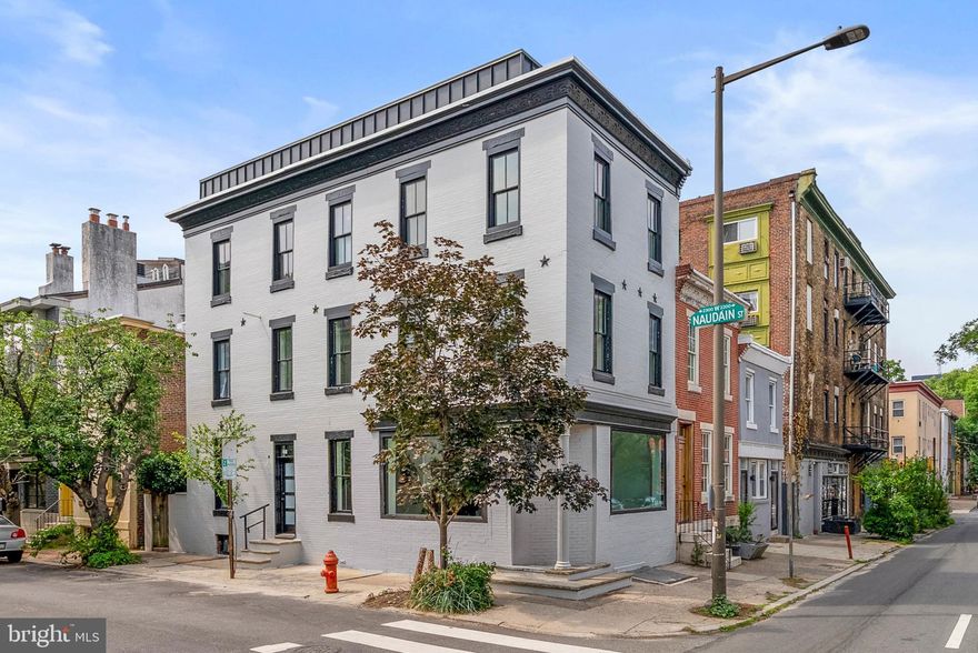 Welcome to this corner masterpiece in Fitler Square. 2301 Naudain was exceptionally designed by AIA award winning Architectural firm LO Design. This residence sits on an 18' foot wide lot and features Top of the Line finishes, Pella Historic windows, a corner brick facade, Herringbone White Oak floors, a Showcase Floating Staircase, and unobstructed rooftop view of the Philadelphia Skyline. 2301 Naudain features 3 spacious bedrooms and 2 full bathrooms; with an option to add a 3rd bathroom and finish the basement. This custom floor plan maximizes every ounce of natural light through oversized windows. The first floor is located on the charming, quiet block of Naudain Street. Walking in through the entrance will make an immediate impression as the kitchen highlights a sleek European Kitchen (imported from Spain), Sub Zero & Wolf appliances, Stone upper cabinets and a central island with Mitered Waterfall edges. The Porcelanosa kitchen has a Panel Ready Sub Zero refrigerator, 5 burner Wolf cooktop, Wolf wall oven, a panel ready dishwasher and pantry.  The living room stands out with 10 foot ceilings,  White Oak floors that were finished on site along with oversized Pella Windows that maximize natural light. The first floor has a personal HVAC zone all for itself. The 2nd level has 2 guest bedrooms with Custom Closets. The washer/dryer is strategically located here for functionality. The third floor Primary Suite is the Crown Jewel of this home. This level has 8 foot tall solid core doors, office/de and one of the largest custom closets you will see in the City. The spa-like bath features heated floors, a Walnut Vanity along with Calcatta Viola tile and Kohler Components fixtures. No detail was spared with floor to ceiling tile. There is an option to add a Custom Fireplace and Wet Bar. The 4th floor landing offers a skylight and glass enclosed windows to shine light down the staircase and middle of the house. The rooftop deck is finished with a TPO roof and ultra high end Matte Black standing seam metal which compliments the sweeping views of the City's beautiful skyline. This residence comes with a FULL 10 YEAR TAX ABATEMENT.