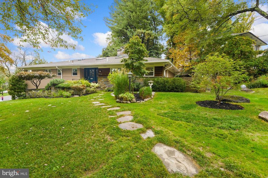 Delightful, light-filled, and improved 4,050 FINISHED SF contemporary comprised of 5 bedrooms and 3.5 baths, outfitted by Restoration Hardware!  Upgraded Kitchen with honed marble countertops; stainless  Bosch, KitchenAid, Thermador, and Viking appliances; Subway tile backsplash; custom cabinetry w/ soft-close drawers and abundant storage.  Hardwood floors, numerous skylights, extra large windows and two fireplaces.  Walk-out lower level features an inviting family room complete with built-in bar and large wood-burning fireplace; bedroom; full bath; spacious home office/studio enveloped in windows; laundry and storage.  Exterior offers attached 2-car garage; extensive stone and brick hardscape with several patio entertaining areas; fully-fenced with privacy backing to trees; and a magnificent kids' tree house!  Within walking distance to Candy Cane park on Beach Drive; easy access to I495, downtown Bethesda and Washington, DC.