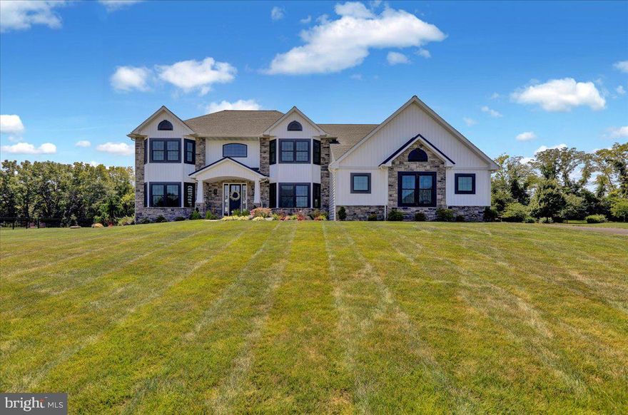 This absolutely STUNNING home in Green Valley Crossings is PERFECT for entertaining!  This is truly Luxury Living!  It features 5 spacious bedrooms, along with 3 full bathrooms and 1 half bath.  Imagine coming home after a long day and being able to relax out on the covered patio where you can look into your private and secluded back yard.  This home also features a convenient first floor bedroom and full bathroom.  Gorgeous spacious kitchen and island with gigantic walk in pantry- perfect to organize all of your food and snacks!  You can't afford to miss out on seeing this home- not to mention it is in proximity to shopping, restaurants, school and much more.  Call today to schedule your personal appointment and showing.