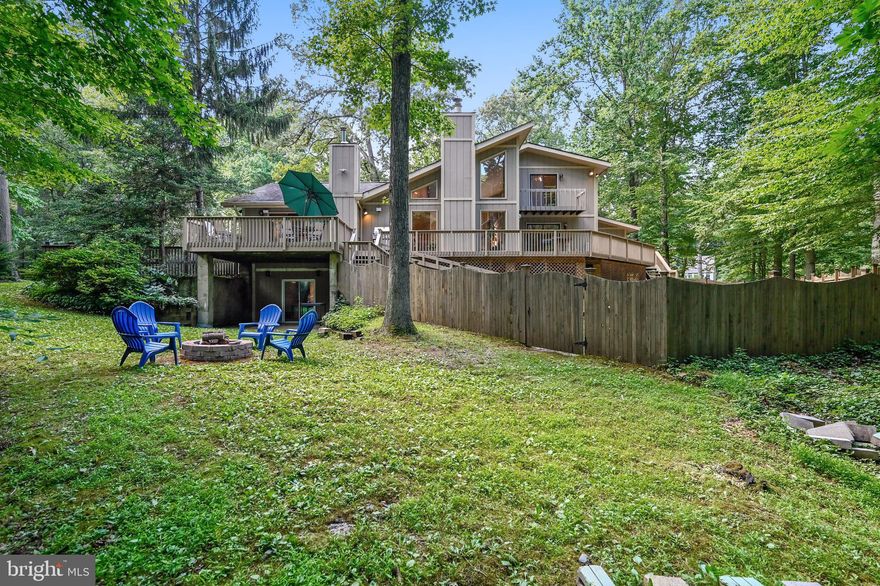 All offers to be submitted by 7:00 August 17th.Buyers got cold feet.  Their loss is your gain! Custom contemporary with open concept nestled on 2 private acres in sought after Hermitage.  The large gourmet kitchen has granite  counters, large kitchen island, 2 wall ovens and stainless steel appliances.  The main level open floor plan has ample space for living/dining, laundry, and multiple sliders to the oversized deck that runs the length of the home.  The owners suite is conveniently located on the main level and boasts an attached study/sitting room,  spa like bathroom with sauna and a walk in closet.  The upper level houses the 3 additional bedrooms.  The second bedroom has it's own bathroom while the third and fourth has a Jack & Jill between them.  The lower level has plenty of storage space, a recreation room and a walk out.  The outdoor space has a HUGE deck for entertaining, 2 fenced areas, wooded space and provides plenty of privacy. Zoned for the NEW CROFTON HIGH SCHOOL!! Possibility to assume seller's VA loan.