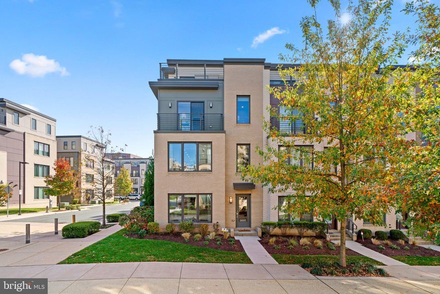 Luxury 4-level, end-unit townhome is finished with high-end materials in highly sought-after Montgomery Row community. Built by EYA in 2018, this freshly painted home meets modern living with flexible spaces great for hybrid work, like the entry-level bedroom/office with ensuite .
The open floor plan on the main level is ideal for entertaining with an impressive 42in. white kitchen cabinetry, 5 burner gas range and large island with separate breakfast bar and gas fireplace.
The primary suite offers dual bathroom sinks and a custom-organized walk-in closet.
The roof terrace off the contemporary loft space is perfect to relax after a day of work with the cozy gas fireplace. The 4th-floor loft with 5th bedroom attached ensuite and walk in closet provides lots of natural light.
This move in ready townhome is quietly tucked amongst office complexes, the community parking is permitted, ensuring spots for guests.
This townhome is just minutes away from Westfield Montgomery Mall & the shops at Wildwood.
Tons of restaurants in downtown Bethesda and easy access to 270 and 495.