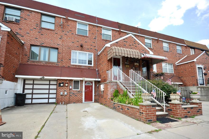 Welcome to 7307 Merganser Place. Beautifully maintained, this 3-bedroom, 2.5-bathroom home is located in the desirable Eastwick section of Philadelphia. From the moment you arrive, you’ll be drawn in by its curb appeal and the convenience of a private front driveway. Inside, a bright entryway welcomes you and leads to a sunlit living area where natural light floods through a large front window, highlighting the warmth of the hardwood floors. The open main level flows seamlessly from the living room to a formal dining area and into a thoughtfully designed kitchen featuring stainless steel appliances, ample cabinetry, tile flooring, and a cozy breakfast area—perfect for your morning coffee or casual dining. Upstairs, you'll find three spacious bedrooms, including a primary suite with his-and-hers closets and a private en-suite bath, along with a second full bathroom in the hallway. The finished lower level adds even more living space with a comfortable family room that opens to a private rear patio, ideal for outdoor entertaining or quiet relaxation. A versatile bonus room on this level offers endless possibilities—use it as a home office, gym, guest room, or creative space. It includes generous closet storage and its own private entrance leading directly to the front driveway. With modern updates, an abundance of natural light, and a flexible layout that suits a variety of lifestyles, this move-in ready home truly has it all. Located just minutes from major highways, public transportation, the airport, and shopping, 7307 Merganser Place is the perfect blend of comfort, convenience, and charm. Schedule your private tour today and see why this is the one you’ve been waiting for.