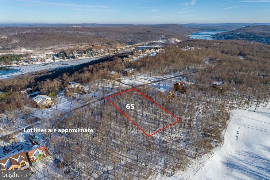 Can't find a home you like? Buy and build it your way!! Just over a half an acre, this homesite rests in the heart of Deep Creek Lake, literally minutes from private Mountaintop Access to the slopes at WISP. Public water and sewer available. Centrally located to state parks, restaurants, and every amenity this area has to offer. Call today for details!