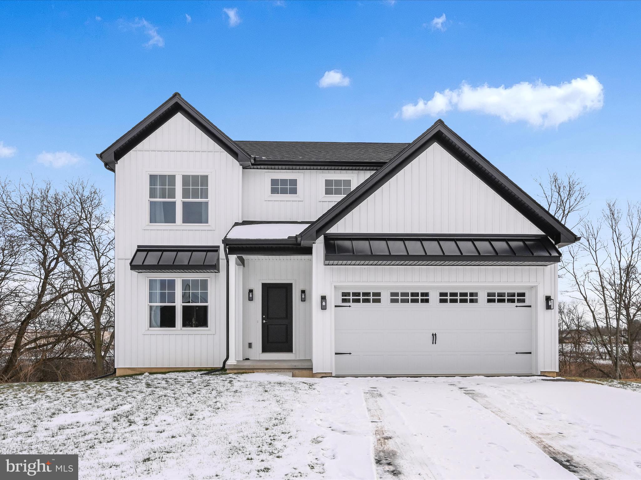 Photos are of a similar model, this home is under construction. The estimated completion date is 7/31/25. Here is your chance to purchase a NEW home on a .4 acre homesite in the highly desired community of Spring Forge! This community is located in Spring Grove Boro and is within minutes of schools, restaurants, shopping, and local amenities. The Baxter model features 4 bedrooms, 2.5 bathrooms, 1,800 square feet of total living space, an oversized 2 car garage, standing seam roof, and a 10'x10 patio! LVP flooring is included on the entire 1st floor and in both full bathrooms! Painted cabinetry and granite countertops are also included in the kitchen! Other homesites and floor plans are also available. What are you waiting for?! Schedule your showing today!