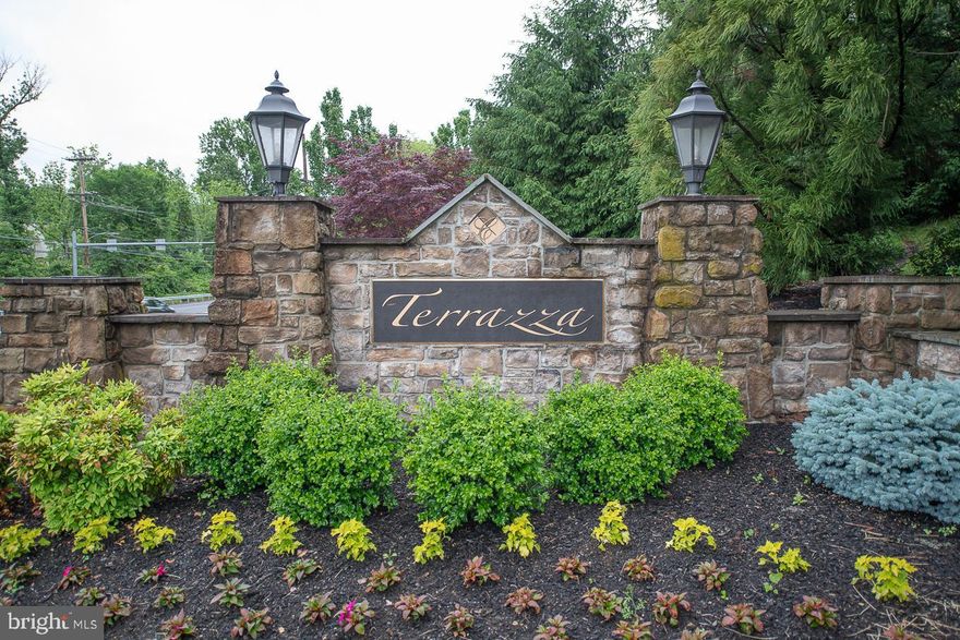 Move right into this meticulously cared for corner, luxury condominium in Terrazza, Newtown Square. The popular Fernleigh model boasts 2 bedrooms, 2 ½ bathrooms, private den/study and large balcony. The location of this unit on the 3rd floor of the newest and quietest of the buildings, far from Rt 252 offers peace and quiet as well as lovely treetop views. The contemporary, open floor plan invites casual, comfortable living as well as great flow for entertaining. You’ll appreciate the Chef’s Kitchen with abundant cabinetry, granite countertops, stainless steel appliances, double oven/range, wine cooler, pantry closet, and breakfast bar. The kitchen opens to the spacious living room featuring a gas fireplace and access to a private balcony with sylvan views. The dining area is generous and can seat a large party for holiday dinners or elegant entertaining. There is a den, or study, with a glass panel door and spacious storage closet for reading, working or TV watching. The luxurious Owners Suite has two walk-in closets, one custom designed, and an ensuite, spa-like bath with a double vanity, jetted tub and separate shower. The second bedroom is nicely sized with an oversized custom designed walk-in closet and private bathroom with a shower stall. Completing this home is a powder room and a large laundry. Included in the sale is an underground parking space and a hard to find, oversized storage closet just steps from the unit. Additional features are hardwood flooring and crown molding in the foyer, kitchen, living and dining room. The HOA fee includes all recreational amenities such as the beautiful clubhouse, fitness center, outdoor pool, tennis and pickleball and a courtyard with a BBQ area. Terrazza is located close to the Main Line, Media, 476, I-95 and Philadelphia International Airport and less than a mile from the Ellis Preserve at Newtown Square Center with a Hilton Garden Inn, Whole Foods and many great shops and restaurants.