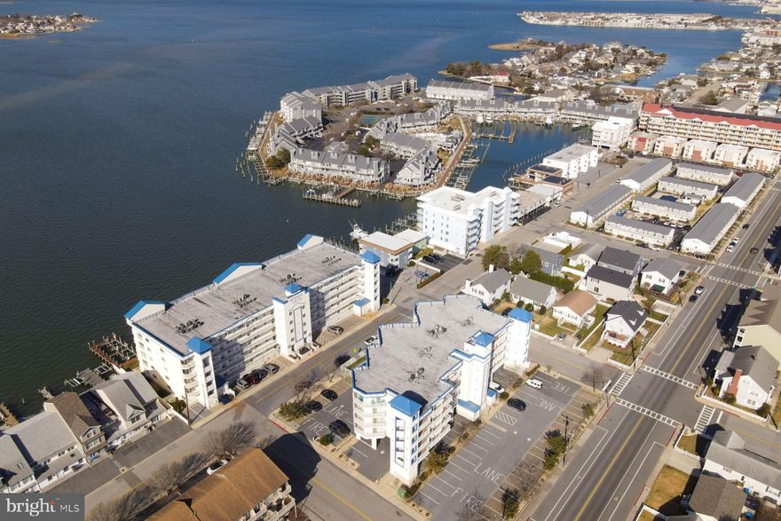 Welcome to your paradise in Ocean City, Maryland! Nestled on the bayside, this stunning 3-bedroom, 2-bathroom condo offers a harmonious blend of coastal charm and modern comfort. With captivating bay views and access to an outdoor pool, this residence is a retreat for those seeking the perfect coastal lifestyle.

Step inside and discover an open-concept living space flooded with natural light, creating an airy and inviting atmosphere. The living room, adorned with tasteful decor, seamlessly connects to the kitchen and a convenient breakfast bar – a perfect setting for entertaining guests or preparing a family meal.

The owner suite, provides a tranquil haven for relaxation. The two additional bedrooms offer ample space for guests or can be transformed into a home office, ensuring versatility to suit your lifestyle.

Enjoy the luxury of two well-appointed bathrooms, designed with modern finishes and thoughtful details. After a day of sun and sand, retreat to your private balcony to unwind and savor the breathtaking vistas of the bay. Whether you're sipping a morning coffee or toasting to a picturesque sunset, this outdoor space becomes your personal oasis.

As a resident of this condominium, you'll have exclusive access to the outdoor pool, providing a refreshing escape during warm summer days. Lounge poolside or take a dip in the ocean – the choice is yours.

Situated on the bayside, this condo offers a peaceful and picturesque setting while still being close to Ocean City's vibrant attractions. Explore the nearby shops, restaurants, and entertainment options or take a leisurely stroll along the popular boardwalk.

Don't miss the opportunity to make this bay-view condo your own – where every day feels like a vacation. Schedule your private tour now and experience the allure of bayside living in Ocean City, Maryland!
