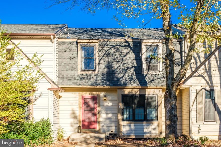 So many updates!!! Nestled in the serene and friendly community of Countryside, this charming 3-bedroom, 2.5-bath townhouse offers both comfort and convenience with stylish finishes throughout. The main level welcomes you with sleek LVP flooring and newer paint, leading to a remodeled modern kitchen featuring stainless steel appliances, granite countertops, tile backsplash, and tile flooring. Another bonus s the built-in microwave/range hood with a a true convection  double oven. A pass-through from the kitchen to the dining room makes entertaining a breeze, and the spacious living room invites relaxation with its wood-burning fireplace, built-ins and ceiling fan. Also enjoy the 8-foot sliding doors that open to a deck overlooking the backyard. An updated powder room on this level adds convenience. Upstairs, the primary bedroom is a retreat with a Hunter ceiling fan, walk-in closet, and direct access to a full bath, complemented by two additional bedrooms, each with ceiling fans and ample closet space. The remodeled shared hall bath impresses with a quartz-topped vanity, towel warmer, and tile flooring, with a large linen closet nearby for extra storage. The lower level features a cozy recreation room with carpet and ceiling fan, an updated full bath with a stall shower, and a storage room with front-loading washer and dryer. Outdoor living is delightful with a Trex deck that steps down to a fully fenced backyard with a patio, ideal for hosting gatherings or just relaxing after a long day. The surrounding community provides a peaceful setting with open space in front and behind, creating a quiet atmosphere, while also offering residents access to walking trails, three pools, and regular neighborhood events. This home is perfect for those seeking a welcoming community with fantastic amenities! Park in #17