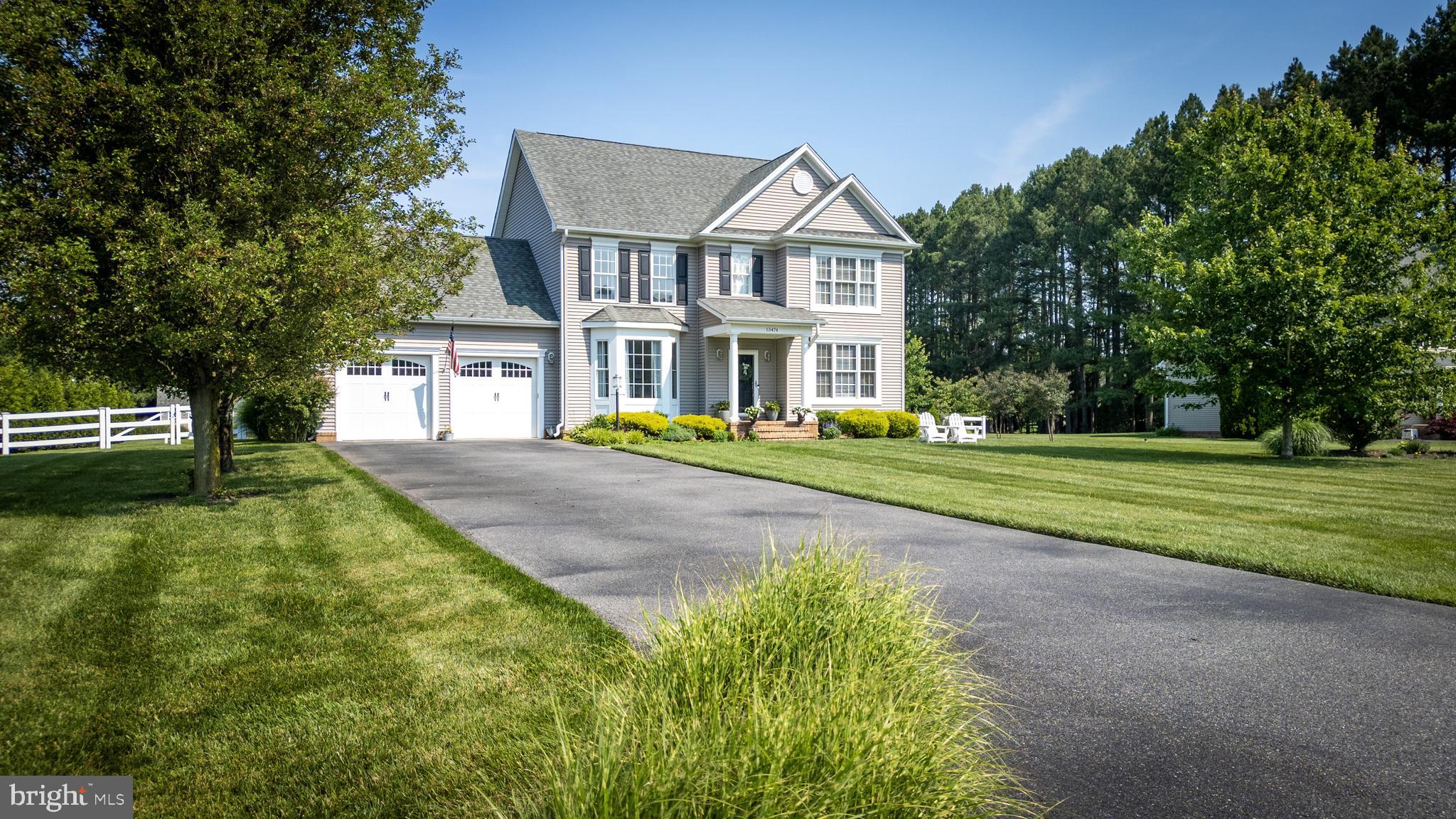 13474 RUSTLING OAKS DRIVE