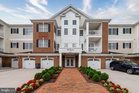Photo of 15110 Heather Mill Ln #307, HAYMARKET, VA 20169 (MLS # VAPW2126292)