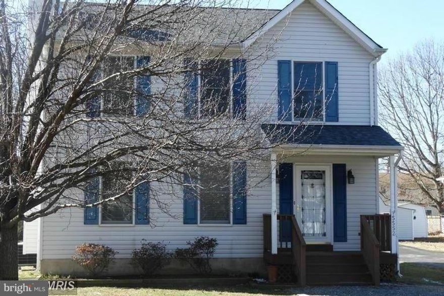 Chesapeake Bay Breezes & Steps to the Bayfront!  3/2ba, spacious and spotless. Easy Commute to DC/Andrews/Fort Meade/Annapolis/NoVa.  Breathtaking WATERVIEWS from balcony and large deck, fenced rear, mahogany hardwoods, LR w/ WB fireplace, gourmet kitchen - recently remodeled with quartz counters and new appliances. Separate Laundry Room with new W/D, formal dining room, crown molding, & more.