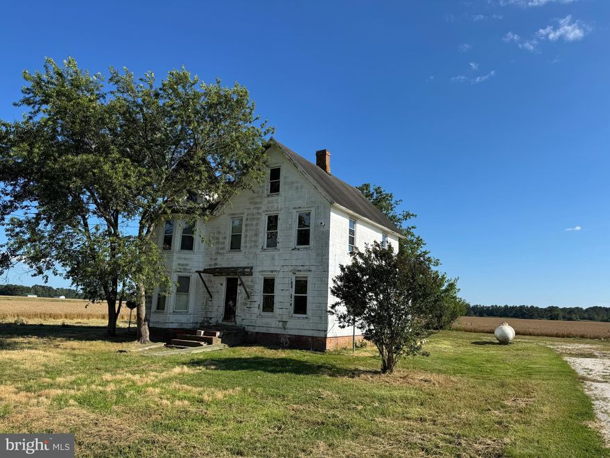 Privacy! Big old farm house with farm fields on three sides and no houses immediately around it on either side. Big 3/4 acre lot provides room for pets, having a big garden, friends or family gatherings, or working on those hobbies that you just can't do in town. A true diamond in the rough. Make this your own personal castle!
