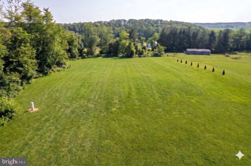 Escape the Inventory Hunt and Build Your Dream Oasis in Carroll County!
Why wait for the perfect house to hit the market when you can buy this lot and build it?   This stunning 1.3-acre lot is a hidden gem, specifically suited for a walk-out lower level which is perfect for doubling your living space with a light-filled lower-level, home office, or recreation area.
Nestled in countryside but never isolated, you are just minutes from Rt 97 - an easy commute to Westminster, Hanover or Littlestown. 
Shovel-Ready Features:  Well Installed: 3 GPM well - Perc Approved: Conventional septic for a 3-bedroom home.
Don't just buy a lot - buy the view, the privacy, and build the home you’ve always wanted!