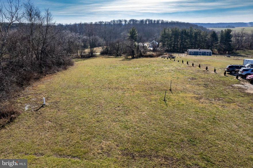 Discover the perfect opportunity to build your dream home on this beautiful 1.3-acre lot nestled in the scenic countryside of rural Carroll County. With limited housing inventory, why settle when you can create a home tailored to your lifestyle?
Conveniently located near Route 97, this property offers easy access to both Westminster and Littlestown for commuting, shopping, and everyday needs. The lot features a 3 GPM well installed in 2016 and is perc approved for a conventional septic system supporting a 3-bedroom home.
According to owner records, the property is zoned Residential. Buyers are advised to verify zoning details and confirm whether any Agricultural Transfer Tax may be due.