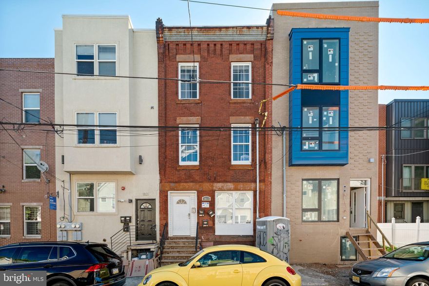 Come take a look at this cash flowing temple triplex. The first floor unit is currently bringing in $1,755/mo. All of the units come with hardwood floors throughout, updated kitchens and spacious bedroom sizes. Unit 2 is currently bringing in $1,800 and unit 3 is bringing in $1,550.  This building is located in the heart of Temple University.