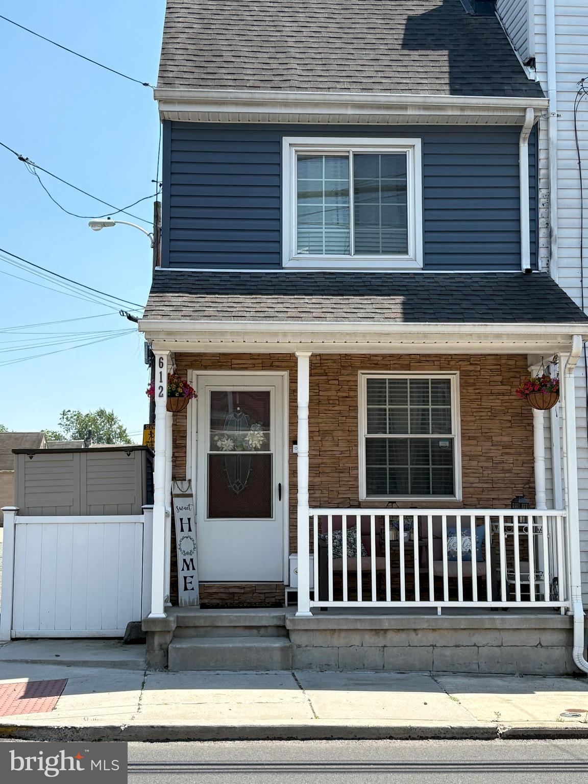 This charming and fully updated home offers the perfect blend of historic charm and modern convenience, right in the heart of town. Renovated top to bottom in 2015 and still in excellent condition, this move-in ready home is just steps away from exciting new restaurants, shops, weekly events, and waterfront entertainment. Enjoy a front row seat to the town’s annual parades and festivals from your own welcoming front porch.
Inside, the bright and open layout features a comfortable living room that flows into a spacious dining area and eat-in kitchen with 42 inch cabinets, granite countertops, recessed lighting, ceramic tile floors, and stainless steel appliances including a built-in microwave. A side entry makes everyday living convenient and functional.
Upstairs offers two nicely sized bedrooms, a full bath, and a dedicated laundry area. The third floor features a finished bonus room with closet—perfect as a third bedroom, office, or creative flex space.
A clean, dry basement accessed from the main level provides plenty of storage.
Additional upgrades from the 2015 renovation include new electrical, plumbing, HVAC, insulation, windows, and carpeting. Outside you’ll find upgraded vinyl siding with stone accents, PVC porch railing, a full PVC privacy fence with solar light caps, and great curb appeal.
Located in a revitalized town center with a growing list of amenities and events, this home is a rare find. Don’t miss your chance—schedule your showing today.