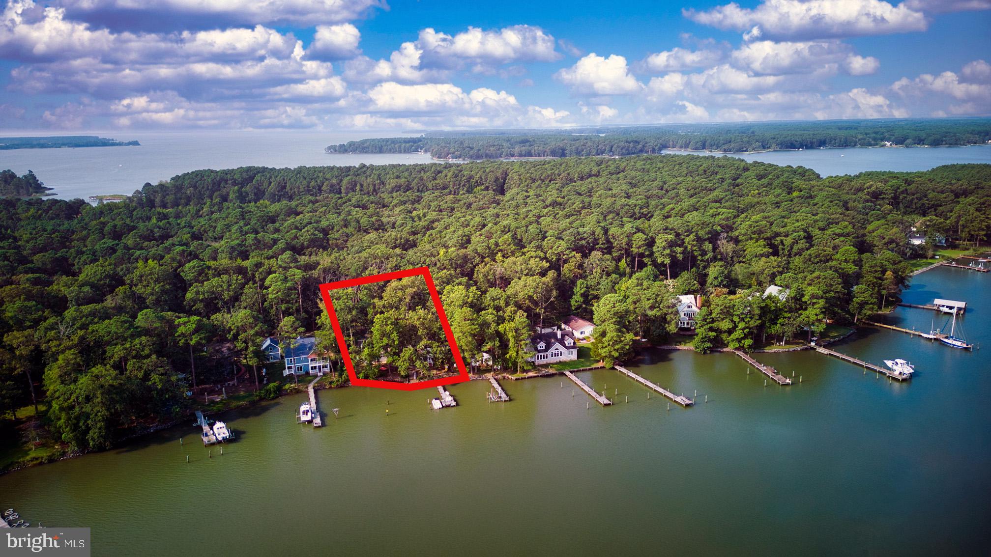 St Michaels is just 2 miles away... Oakwood park known to be a slice of Eastern Shore heaven. This one story cottage with a dreamy porch and carriage house serves as the owners get away and vacation rental. Features are riprap shoreline and a boat ramp, the Carriage house with second floor guest and a balcony overlooking San Domingo Creek, a 2 car garage with workshop, laundry space and ample storage.
Public sewer will be available this year, this will open more possibilities.
The next door cottage 24312 is listed for sale at $ 825,000.