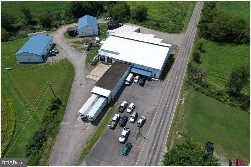 This 7+/- acre, Bradford County property contains an operational USDA inspected slaughterhouse. Built
in 1976, the main building is a two story 8000 sq ft processing center that includes 2500 sq ft of indoor holding pens, a harvest floor, processing room, packaging room, 825 sq ft beef/ offal cooler, 1380 sq.ft pre chill cooler, 1740 sq ft shipping cooler, a 924 sq.ft freezer with pallet racks, office, employee break room and storage rooms. Property has its own operational wastewater treatment plant on site and a
large 4000 sq ft maintenance shop/garage. Being sold turnkey with all equipment needed to resume operations.