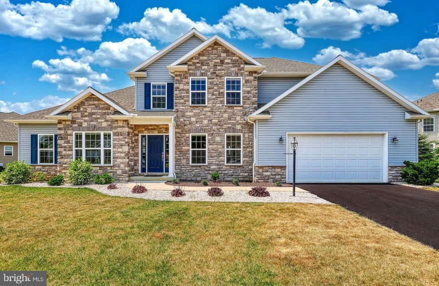Modern luxury and comfort meets first floor living in Mechanicsburg. Tamanini Homes 2017 build, lightly lived in and meticulously maintained. Stunning curb appeal with simple and subtle landscaping. Upscale Trindle Station Community. Cumberland Valley Schools. Over 4,700 SF of must-see, quality constructed living space including finished lower level. Spacious open foyer, 9’ ceilings with recessed lighting and durable yet beautiful LVP flooring running throughout. Private office with French doors, painted accent wall and bay window. Elegant dining area with shadow box molding, pendant lighting and crown molding. Vaulted two story great room, floor to ceiling stone gas fireplace with decorative mantel. Open concept layout with tons of windows illuminating the home with natural light. Designer kitchen with stainless steel GE appliances, double oven with electric cooktop, under cabinet lighting, granite countertops, pantry and center island with overhang. Cozy breakfast nook with bay window. 14x16’ covered back patio with built-in fan for a cool breeze. Generously-sized main level owner’s retreat, large walk-in closet, opulent five piece bath with ceramic tile flooring, double bowl vanity sink, walk-in tiled shower with glass door, toiletry nook, pull down water sprayer and bench. Large soaker tub with tile surround. Grand staircase leads to three nice sized bedrooms all with impressive walk-in closets. One bedroom has private vanity with sink and direct access to the hall bath giving the room an ensuite feel. Massive finished lower level with 9’ Anderson drop ceilings, recessed LED lighting and LVP flooring with 8” base trim. Bathroom is framed in and ready for your finishing touches. Ample unfinished space, perfect for storage. Energy efficient gas heat and hot water. Main level laundry with utility sink. Clean and spacious two car garage with carpet tile flooring. Neighborhood park. Easy access to shopping, grocery, pharmacy and healthcare. (When entering the neighborhood, make first right onto Franklin Drive, home is 7th on the left.)