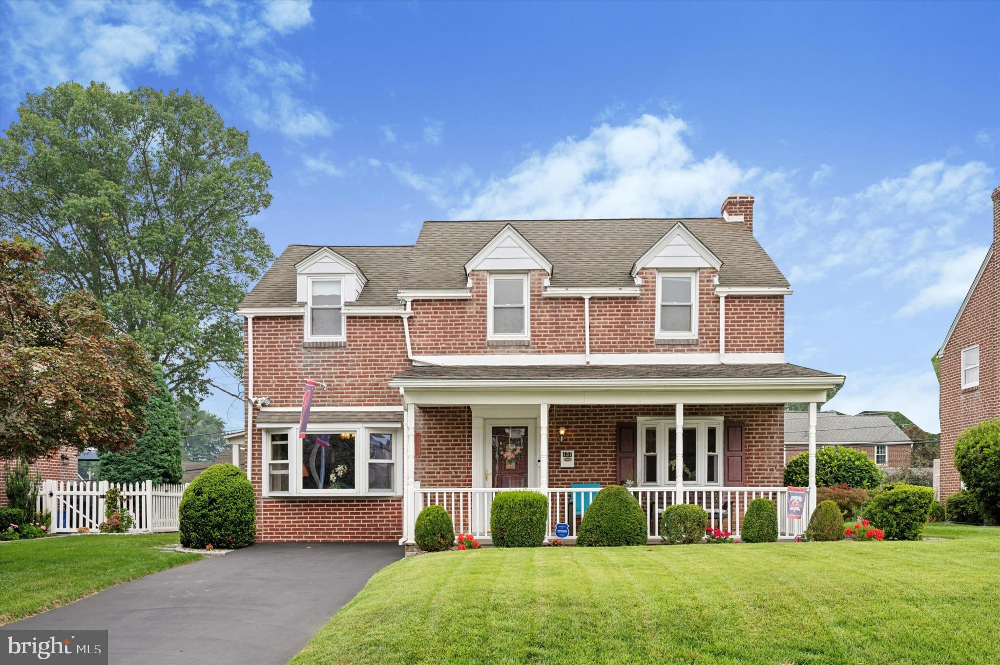 Welcome to this well maintained red brick colonial in the Drexel Hill neighborhood of Haverford Twp! Situated on a sidewalk lined street in the middle of the block, this wonderfully cared for home offers great spaces and amenities throughout! Walking up, you’ll notice a great looking yard with private driveway and a welcoming covered front porch with elegant stone floor. The first floor begins with a large living room with crown molding, separated from the formal dining room with a half wall that opens up the space. From the dining room you enter a large eat-in kitchen with wood cabinetry, tile floors, granite countertops, tile backsplash, white appliances and plenty of room for a breakfast table. The room opens to the left into a cozy den space (or office) with an accent wall of rough cut wood and large bay window at the front. A exterior door off the side of the kitchen leads out to the a beautiful covered composite deck with vinyl railings and overlooks a meticulously kept yard offering great space for entertaining and gardening (includes a storage shed). The 2nd floor presents 3 good sized bedrooms along with a full hall bath with tub and tile surround. Stairs off the kitchen lead down to a finished basement that includes further living space, a laundry area, storage and a 2nd full bath with stall shower. Other great features include insulated windows, a dimensional shingle roof, a split system in the den kitchen area (1st floor air conditioning), and hardwood floors! Located just minutes from Parks and Trails at Merry Place and Steel Field, Schools (Haverford Township Schools, Manoa Elementary School), as well as, restaurants and shopping along Township Line and West Chester Pike. Don’t miss this great opportunity!