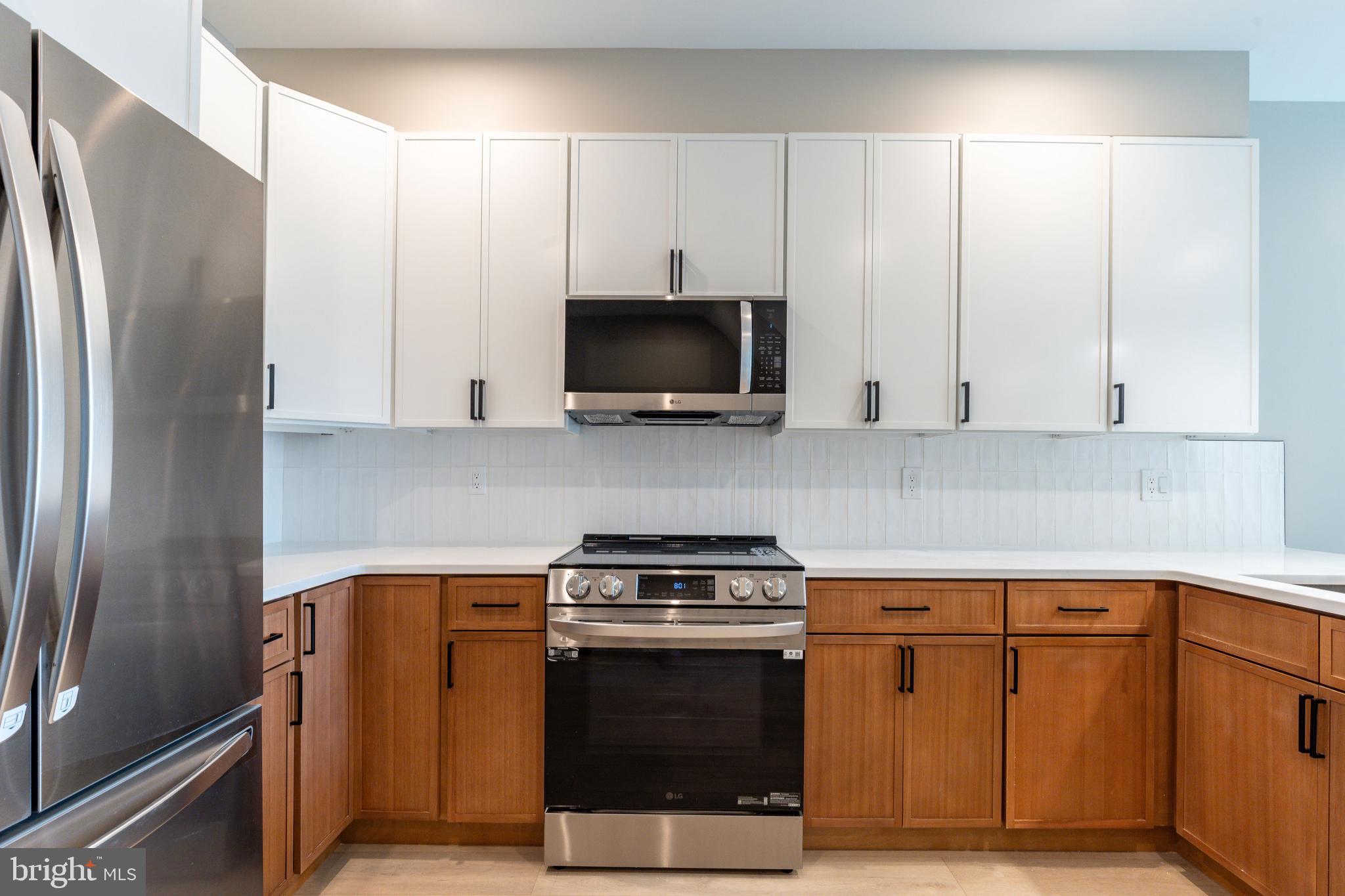 Welcome to 2048 N 3rd Street, a newly constructed DUPLEX boasting 6 bedrooms and 4 bathrooms (3/2 in each unit), a 10 YEAR TAX ABATEMENT and 1 YEAR BUILDERS WARRANTY! Take advantage of everything that comes with this location which includes the redesign of the American Street Corridor and walking distance to the Berks L Stop taking you into center city, LMNO, Kalaya, Goldie, Suraya, Evil Genius Beer Company, Human Robot Brewing Company, Stateside Vodka, The Ground Coffee, Plants, and Gifts, Luna Cafe, Cousins Supermarket, and Norris Square! With projected income of $4400/month or $52,800/year this cash cow will not last long! Qualify for a grant of up to $17,500 in free grant money, making your homeownership dreams a reality with just 3% down and low PMI for owner occupied buyers! (Income restrictions apply)
Step into this 4-story, duplex to explore its open-plan living space and modern kitchen, featuring exquisite quartz countertops with a waterfall edge, two-toned shaker cabinets, a modern subway-tiled backsplash, and high-end stainless steel appliances, including a microwave, slide in range, dishwasher, and a spacious fridge. Each bedroom is equipped with ample closet space, and the 2 full bathrooms showcase beautifully tiled showers with glass doors and large shower heads. The building is equipped with security cameras and an alarm system.
Unit 1 (1st floor and basement) offers a delightful backyard, providing the perfect escape with a projected monthly rent of $2400, while Unit 2 (2nd and 3rd floor) boasts a private rooftop deck with stunning views of the Philadelphia city center and projected monthly rent of $2,000 for a total of $4,400/month or $52,800.
Don't miss out on this exceptional opportunity to merge luxury living with financial advantages. Reach out to the listing agent today for more details and to schedule a viewing.