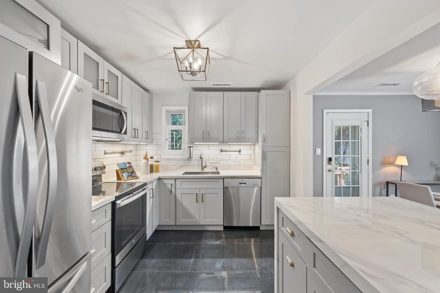 1168 square feet of wonderful space on 3 levels - AND an attic!!!  Step  into this beautifully renovated 
The perfect starter home or down-sizer in Chevy Chase’s most desirable townhome community.  This lovely corner unit has 1180sqft of above ground living space an additional 600sqft in the finished basement and wall the wall storage space in the pull-down attic for approximately 2100sqft of usable interior space.  Walk in from your reserved parking spot to the main floor with its modest living room, 1/2 bath, updated open kitchen with stainless steel appliances, and dining room that connects to a large walk out deck.  

Upstairs you’ll find two large en-suite bedrooms  with walk-in closets.  In the basement two rooms for your private office, playroom, home gym, or family room, full bath, and utility room with full sized washer dryer and space for an extra upright freezer .  Designer touches throughout including custom light fixtures and window treatments.  Walk to the  Capital Crescent Trail in 1 minute and Bethesda Row in 5 from this family-friendly neighborhood. Urban suburban living at its finest!

Plus, this pet-friendly community welcomes Fido with open arms.

Located steps from the Capital Crescent Trail, Bethesda Pool, and all the shopping, dining, and entertainment downtown Bethesda has to offer. Metro access and grocery stores are just around the corner, making this townhome a true gem