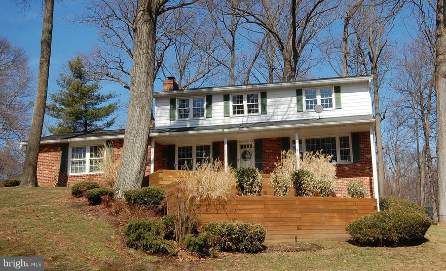 Welcome to this spacious 4–5 bedroom, 3 full bath home sited on a desirable corner lot in the sought-after Centennial School district. Featuring gleaming hardwood floors throughout the main and upper levels, this home offers a warm and inviting atmosphere. The large sunroom off the kitchen is perfect for relaxing or entertaining, while the updated bathrooms add a touch of modern comfort. The finished lower level includes a full bath, ideal for guests, recreation room or a private retreat. With a generous shed, abundant storage throughout, and plenty of room to grow, this home combines functionality with charm in a prime location.