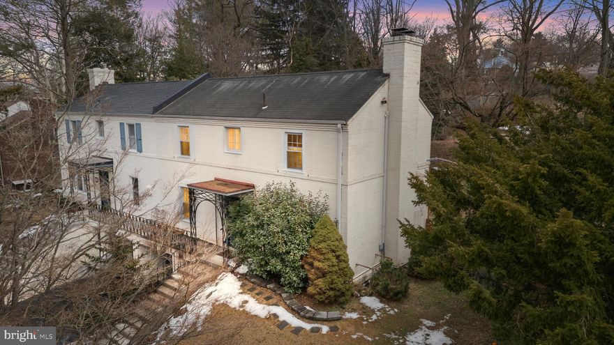 Back on market!  Nestled on a beautiful, tree-lined street in desirable Andorra, this charming 3-bedroom, 2.5 bath home offers privacy, character, and meaningful updates on nearly a quarter-acre lot.  Inside, you will immediately appreciate the preserved hardwood floors and classic architectural details that give the home warmth and personality.  The living area features built-ins and a wood-burning fireplace, creating a comfortable and inviting space to relax or entertain.  The kitchen is completed with granite countertops and opens to a generously sized dining area, making it ideal for everyday living and hosting.  All bathrooms have been tastefully updated, providing modern finishes and functionality.  The lower level offers additional usable space with a finished room, dedicated laundry area, utility sink, storage, and exterior access to the attached one-car garage.  Step outside to a covered patio overlooking beautifully landscaped, tiered grounds with mature trees.  Located just minutes from shopping, dining, and transportation, and within walking distance to Fairmount Park trails, Wissahickon trails, Forbidden Drive, and the Schuylkill Nature Center, this home offers both convenience and natural beauty.  Move-in ready with character and updates throughout.  Schedule your tour today!