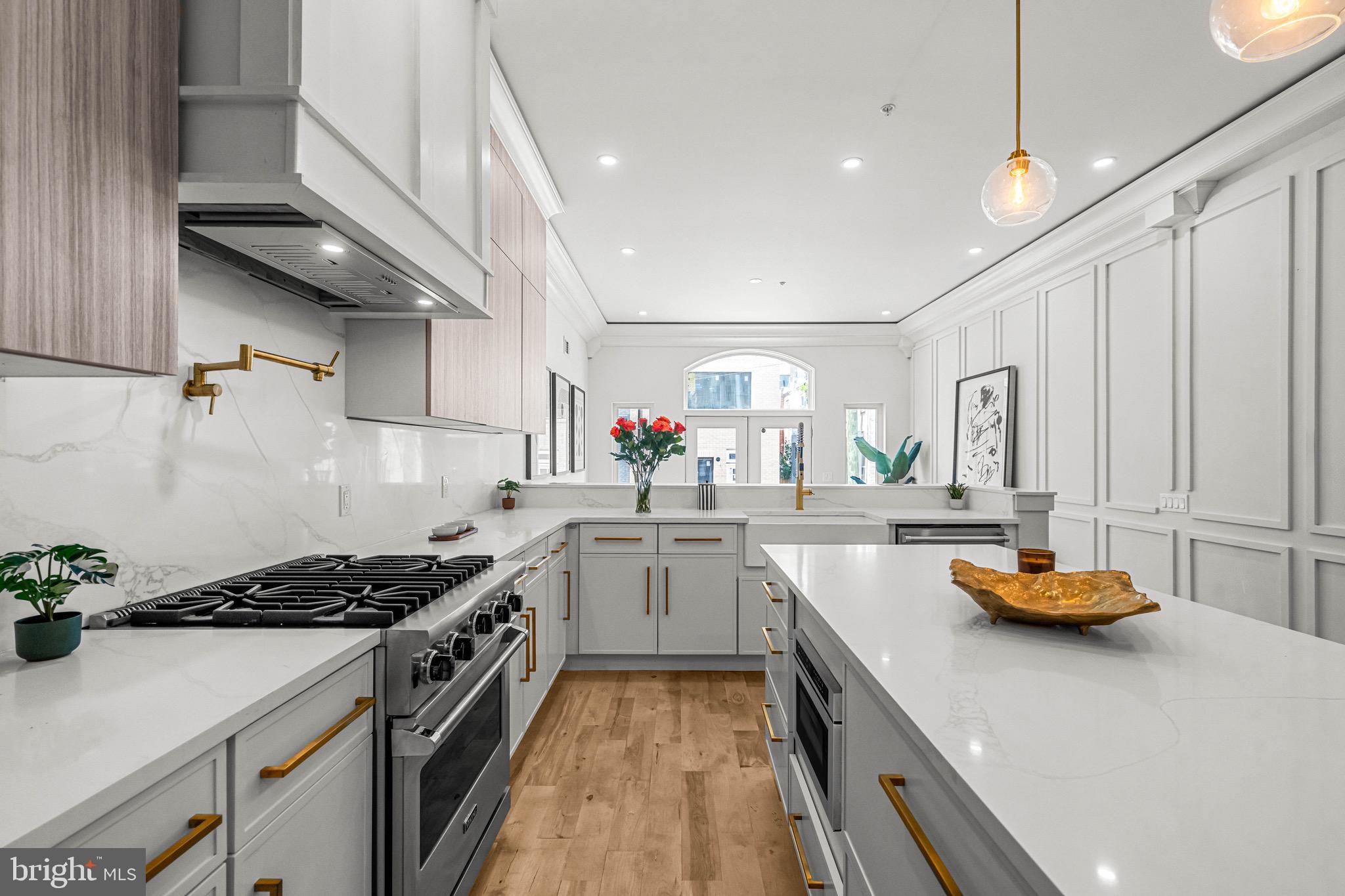 Welcome to contemporary luxury in the heart of Northern Liberties! This brand-new construction property offers a spacious 3,400 sq. ft. of sophisticated living, featuring 4 bedrooms and 4 full baths, along with 2 convenient half baths and 2-car rear parking! Step inside and be greeted by elegant design and top-notch finishes throughout. The home includes a 5-stop elevator, making it easy to navigate between floors. The finished basement provides additional versatile space, perfect for a home theater, gym, or playroom. The highlight of this property is its stunning three-tiered roof deck, complete with a covered pergola. This exceptional outdoor space is ideal for entertaining guests or simply enjoying breathtaking panoramic views of the city. Whether hosting a lively gathering or relaxing after a long day, the roof deck is a true urban oasis. The property also features a 2-car parking space, adding to your convenience. Situated within walking distance of the vibrant shops, restaurants, and nightlife on 2nd Street, and just a stone’s throw from Fishtown, you'll be at the center of all the action. This location is perfect for festival-goers and anyone looking to immerse themselves in Philadelphia’s dynamic culture. Experience modern elegance and urban excitement in one incredible home!