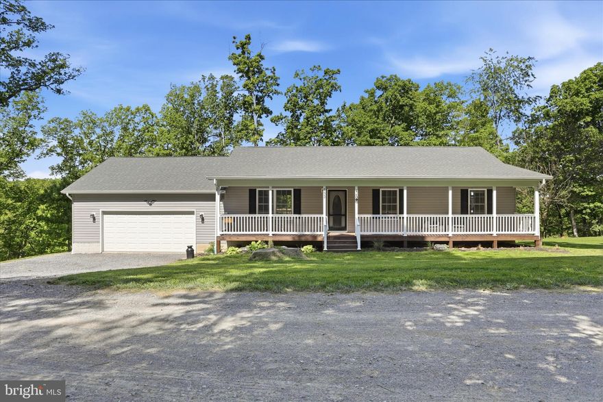 Welcome to 153 Chrissys Circle in beautiful Harpers Ferry, WV—a thoughtfully designed home built in 2021 that perfectly blends modern comfort with peaceful surroundings.

This inviting 3-bedroom, 2-bath home offers a warm and functional layout ideal for everyday living. Start your mornings on the cozy front porch, the perfect spot for coffee and relaxation. Out back, enjoy a spacious deck that’s great for entertaining, grilling, or unwinding after a long day.

Inside, you'll find a bright and open living space with well-appointed finishes throughout. The home also features a partially finished basement, providing additional living or recreational space, plus a rough-in for a third full bathroom, giving you the flexibility to expand as needed.

Car enthusiasts, hobbyists, or those needing extra storage will love the oversized 26x28 garage, offering ample room for vehicles, tools, and more.

Located just 5 minutes from the Loudoun County line, this home is ideal for commuters while still offering the tranquility of West Virginia living. Enjoy being near the scenic Shenandoah River, perfect for outdoor adventures, and take advantage of the neighborhood’s private pond, adding to the peaceful charm of the community.