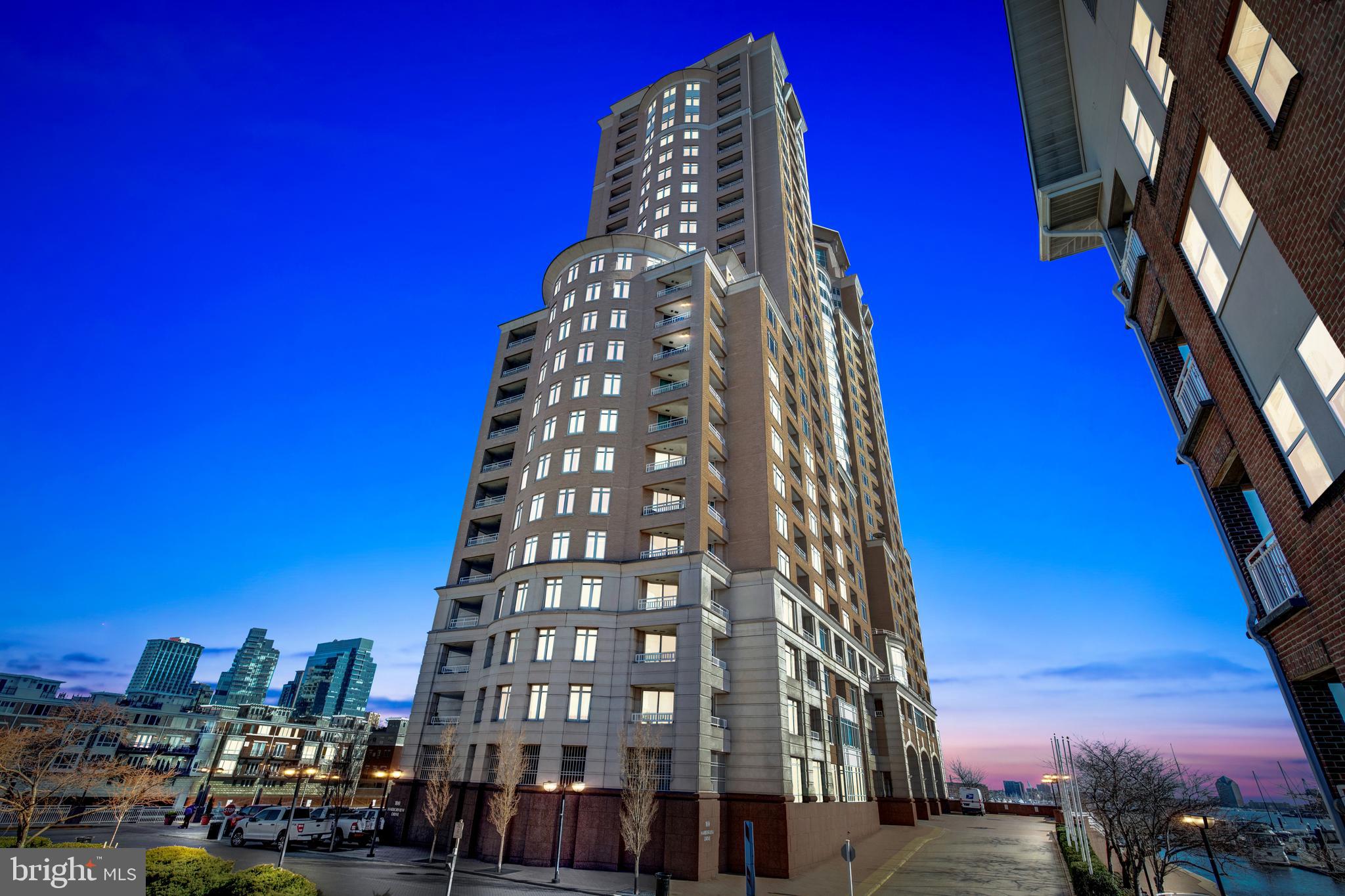 Welcome to Harborview Towers - Experience elevated luxury living in the heart of downtown Baltimore with captivating water views! This sophisticated condo boasts a modern design with stylish accents and recent updates, providing a seamless blend of comfort and elegance. Revel in the mesmerizing city lights and breathtaking water vistas from your private balcony overlooking Baltimore's iconic Inner Harbor waterfront. Step into a thoughtfully designed open floor plan that accentuates the spacious living and dining areas, complemented by a large slider leading to the balcony. The well-appointed kitchen features a convenient pass-through and granite countertops, creating an ideal space for both entertaining and daily living. The main suite exudes charm with a bay window, balcony access, and a generously sized walk-in closet. Indulge in the luxury of the full bathroom, adorned with exquisite finishes. This residence is part of a full-service building offering an array of premium amenities and services. The 24/7 front desk provides concierge and doorman services, while additional perks include a billiard room, social lounge, conference rooms, outdoor patio grill area, and a fitness center equipped with steam and sauna facilities. Guest suites and a business center further enhance the upscale living experience. Surrounded by beautifully landscaped community grounds featuring walking/jogging paths, seasonal flowers, and water fountains, this condo also offers on-site conveniences such as a Gourmet Deli, patio dining, security staff, and ample guest parking. Conveniently located near dining establishments, shops, stadiums, the business district, MARC train, and just 10 miles from BWI International Airport, this property is a must see for those seeking a luxurious urban lifestyle with unparalleled waterfront views!