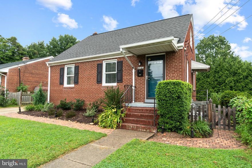 Meticulously maintained and conveniently located updated cape cod immediately off Route 1- walking distance to bus stops, shopping, restaurants and so much more.   Brand new updated and sun-filled kitchen, freshly painted living room and dining room with hardwood floors and newer windows. On the main level, there  are two spacious bedrooms and a fully remodeled bathroom with crisp white subway tile and all new fixtures. Upstairs awaits the perfect master bedroom retreat with a half bath and multiple closets! The lower level features a large finished rec room, with a full finished bath with walk in shower, kitchenette space with sink and cabinet space, plus extra storage area and large extra finished room for den or such. Basement also has separate entrance allowing for guest/ housemates or others to come and go and not disturb the upstairs. Backyard is fully fenced with a gorgeous patio with gate access to the front of the home on either side! Concrete driveway allows parking for 2 + cars! Don't miss this one!