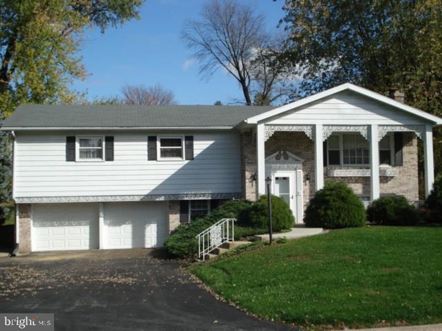Spacious open floor plan with great potential on large park like lot in desirable neighborhood! Features include hardwood floors, ceramic tile baths, brick fireplace, and screened porch. Property being sold "As Is."