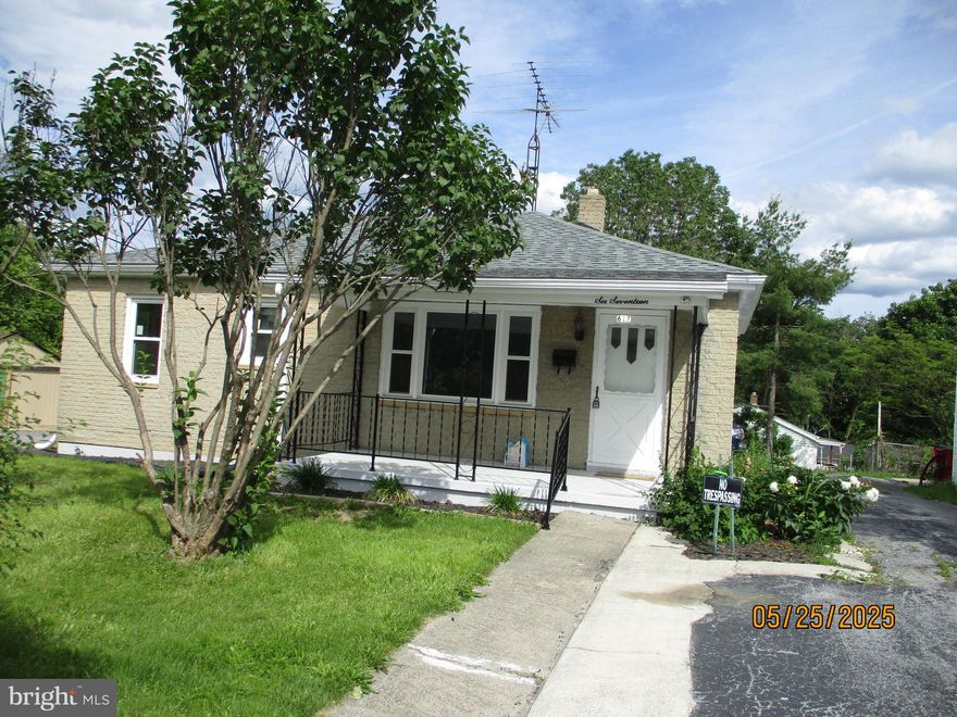 parking is in the rear, newly renovated, hardwood floors redone, new painting,Great condition!